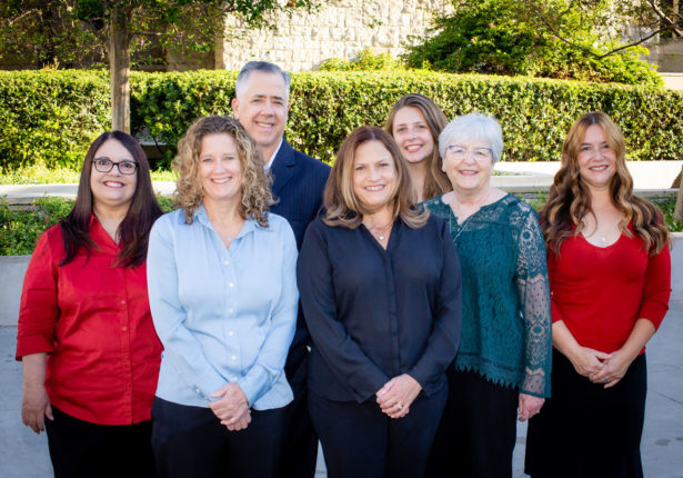 Group picture of the Seright Escrow team standing