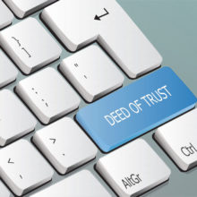 Deed of Trust written on a keyboard button