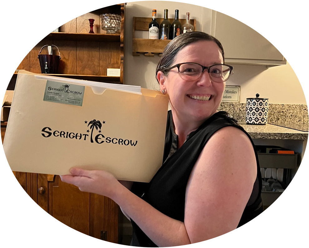 Amy a happy customer holding a Seright Escrow folder.